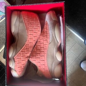 Stylish Pink and Tan Sneakers with Modern Design